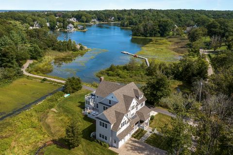 Experience luxury, comfort, and style at 28 Black Horse Lane. Spectacular water views delight from nearly every room in this newly built magnificent residence, situated just 1/2 mile to Cohasset Village. The soaring ceilings and oversized windows aff...