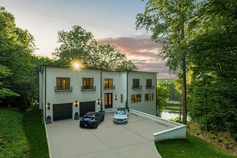 Welcome to this exquisite Riverfront Gem - Immerse yourself in the serene and lavish lifestyle offered by this contemporary masterpiece, showcasing breathtaking views of the wide expanse of the river. Designed for refined living on the water, this pr...