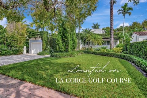 Right on the La Gorce Golf Course, enjoy amazing course views & incredible sunsets. As you enter, you'll be impressed with the open & spacious 3,086SF floor plan while greeted with views of the lush backyard, pool, & golf course. There are marble & w...