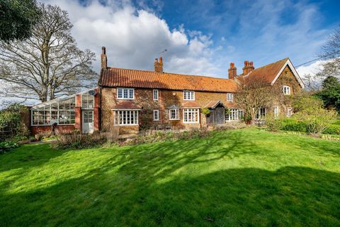 In the popular West Norfolk coastal village of Heacham, this amazing, detached period property has so much character with many original features including exposed ceiling beams and carved lintels over doors and hearths. The living accommodation withi...