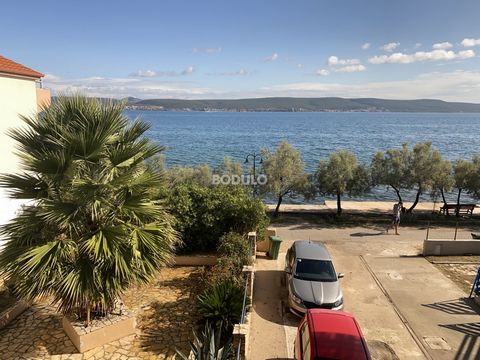 In a quiet place Neviđane, which is located in the heart of the island of Pašman, for sale is a family house with a total gross area of 304.55 m2. This property is located in a prime location - first row to the sea. The stated gross area refers to th...
