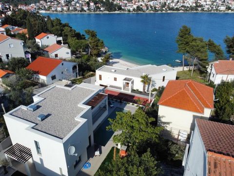 Exceptional modern villa with swimming pool just 40 m from the beach on the Ciovo peninsula near UNESCO-protected town of Trogir. The villa offers a partial sea view and wonderful ambience of a new home. Villa offers everything to be considered almos...