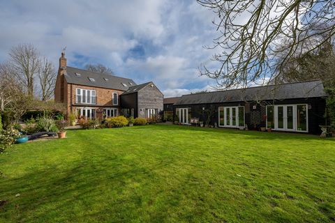 The Smithy - Modernity in a Historic Fenland Village. This award-winning property is more than just a house; it's a testament to innovative design and a respectful embrace of history. With its versatile living areas, luxurious amenities, and idyllic ...