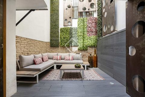 This duplex loft is a unique piece in Eixample. The property can be accessed through two independent entrances, one at street level through a glass door with privacy or through the entrance from La Finca. We enter through a large hall that has two le...
