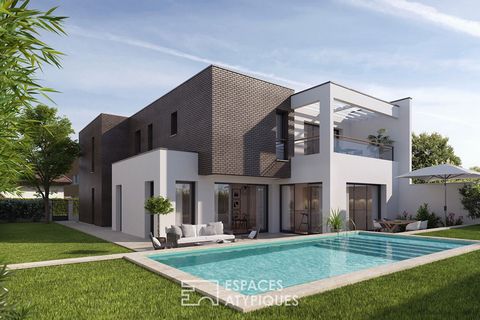 This magnificent contemporary house of 220 m2, erected on two levels, is located in a peaceful setting near the town centre of Le Bouscat. As soon as you enter, the luminosity that reigns in the large living room of 56 m2 sets the tone. The large win...