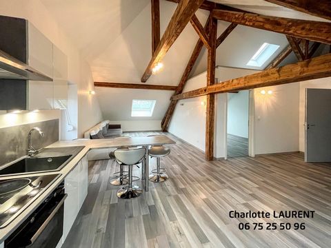 Charlotte LAURENT exclusively presents this atypical 90m2 loft-type apartment (65m2Carrez) on the top floor of a small, perfectly maintained condominium. Ideally located a stone's throw from the center of Remiremont and a few minutes from the express...