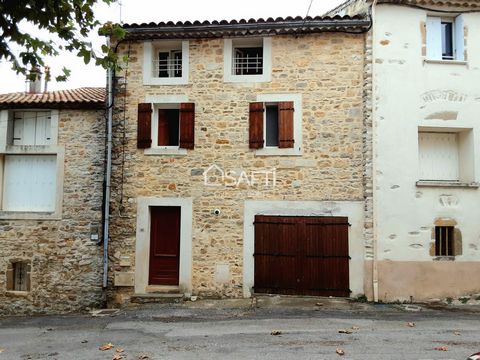 In the heart of the pretty village of Curviers Lascours between Nîmes and Alès, discover this stone house of more than 73m2 with a garage. On the ground floor, an entrance, a laundry room, a toilet and direct access to the garage. On the 1st floor a ...