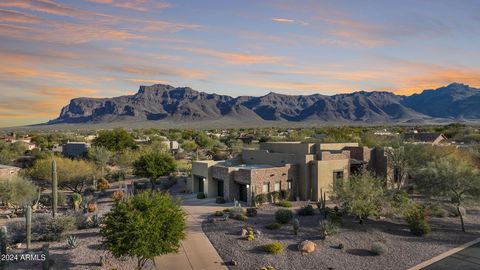Back on market due to buyer contingency. Indulge in breathtaking views of Superstition Mountain from this luxurious 3 bedroom, 3 ½ bath home within the guard gated Superstition Mountain Golf & Country Club. Meticulously updated from top to bottom, th...