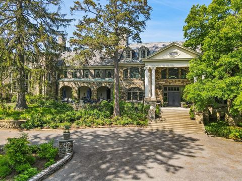 Iconic stone estate on nearly five level acres with sprawling lawns, three bedroom guest cottage, two bedroom caretaker's barn and 50' pool. This home offers six+ bedrooms, nine baths and room for everyone. Entertain on a grand scale with your very o...
