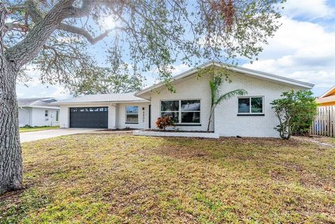 Located in the desirable Village Green neighborhood of NW Bradenton, just minutes from Anna Maria Island, this charming 3-bedroom, 2-bathroom home is fully updated with modern comforts, including a new roof (2024) and AC (2022). The large, updated ki...