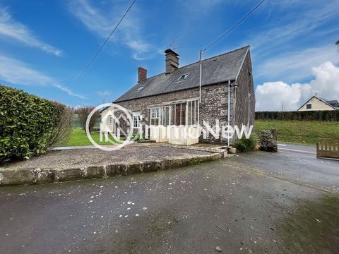 Immonew presents in the town of Sourdeval, a charming 4-room stone house of 100.4m2 on 2162m2 of land and its outbuildings. On a fenced and wooded plot of about 2162m2 this house consists of: - On the ground floor: a living room with a large stone fi...