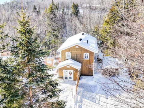 Welcome to Saint-Hippolyte at 116 104th Avenue. Discover this charming cottage with large living room, slow combustion stove, 2 bedrooms, office (convertible into a 3rd bedroom), 2 bathrooms, laundry room, open kitchen and convivial dining room (See ...