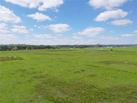 This property is a rare find here in Polk county 34.59 acres of pasture land on the corner of walker road and Bella vista completely fenced with well and electricity. With an additional 25.68 acres parcel. These 2 properties are adjacent to each othe...