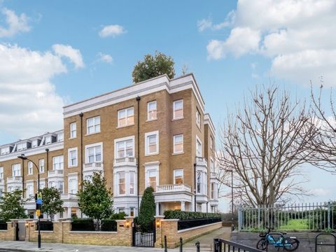 This exquisite Georgian-style family townhouse offers over 5,000 sq. ft. of luxurious living space, complete with stunning facades, uninterrupted views of the River Thames, and Barnes Wetland Centre. Its beautifully landscaped rear garden, designed b...