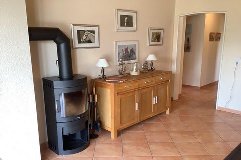 Spacious holiday home in the new part of the holiday park with approx. 90 sqm, ideal for up to 6 people. The cozy living room with fireplace invites you to relax, while the kitchen with dining area offers everything for shared meals. The facilities i...