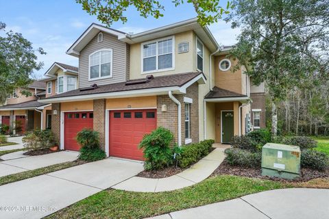 Beautifully-updated, two-story end unit condo with an attached garage in gated community. You'll appreciate the fresh interior paint, LVP flooring, AC 2023 and many other updates throughout. Enjoy a great kitchen with ample cooking, storage and count...