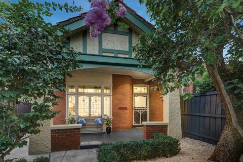 Set within peaceful, high-walled gardens, this stunning solid-brick Edwardian home offers an exceptional blend of period charm and modern convenience. Positioned on the edge of Kew Junction, and just a short stroll from some of Melbourne's best schoo...