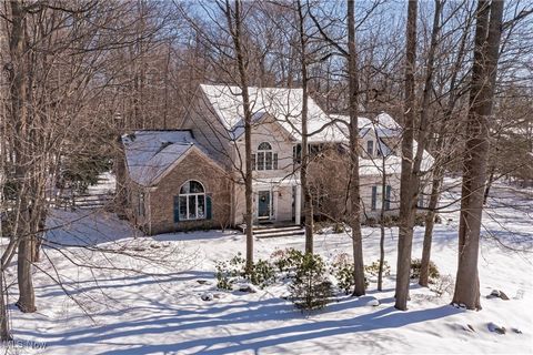 Situated on a beautifully wooded corner lot in Canyon Lakes, this stately colonial provides incredible living space in a beautiful, parklike setting. Step inside to a thoughtfully designed floor plan that effortlessly blends style and comfort. Neutra...