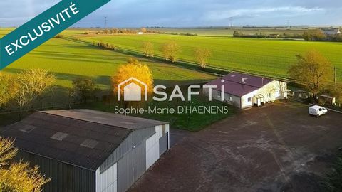 Maison de plain-pied avec hangar