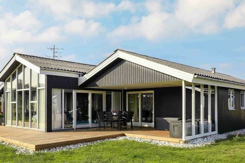 Energy-efficient and wheelchair-accessible holiday cottage located on a large plot close to Ringkøbing Fjord on one side and the North Sea on the other. The focal point of the house is the 18 m² large swimming pool with a hoist for wheelchair users. ...