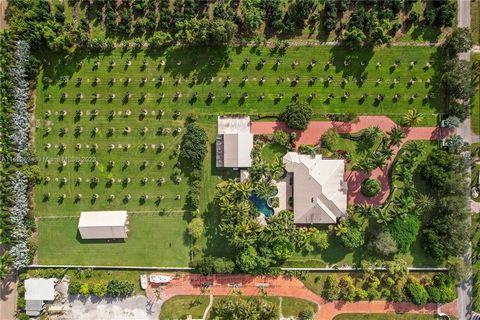Located in Redland, Miami Dade's Agriculture community, sits a custom 2009 gentleman's 5 acre country estate with a tropical flair. She's a big girl with 9000 sq. ft. under roof and 5500 under air, tastefully appointed, designed & built to last gener...