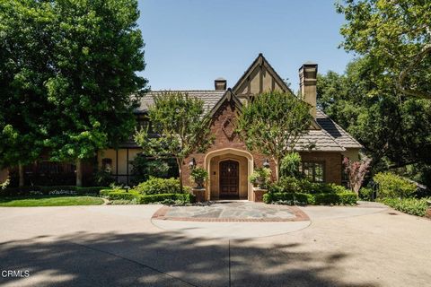 Welcome to The Oaks, nestled on an expansive nearly 3 acre property with magical gardens. This extraordinary gated estate on two parcels transports you to a world of timeless beauty and serenity. Privately sited in a highly desirable location in La C...