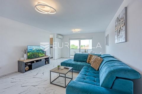 Istria, Umag, a modernly equipped three-bedroom apartment with a closed area of 79m2 is available for long-term rent. The apartment is located in a quiet area within a residential building, just a ten-minute drive from the city center. It consists of...