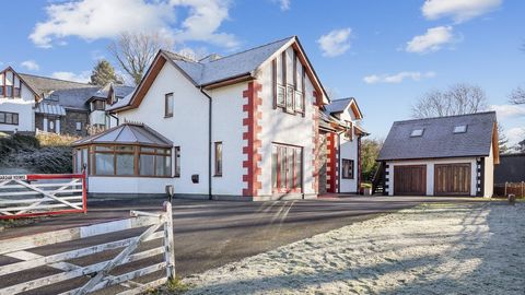 Fine and Country West Wales proudly presents Saardar Younis, a distinguished four/five-bedroom detached residence gracing the market for the first time since its construction in 2002. Nestled on the outskirts of Aberystwyth, this exquisite property o...