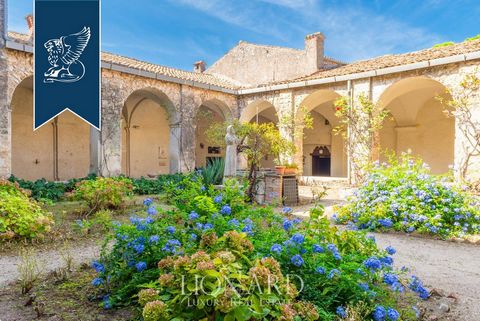 In the very heart of the village of Ciociaria in Lazio, in the province of Frosinon, a wonderful old villa is sold, rebuilt from the former monastery of the XIV century. Villa with an area of ​​more than 1000 square meters with a private panoramic ga...