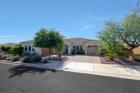 Nestled in the coveted Blossom Hills gated community, this north/south-facing luxury residence is a haven of sophistication and convenience. Positioned near the serene South Mountain Preserve, and with easy access to I10 and the 60, as well as a plet...