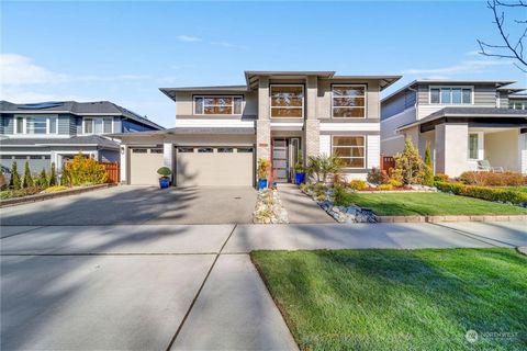Situated in the serene community of Tehaleh, this exquisite Mainvue residence extends over 3, 652 square ft. The home features 4 bedrooms, 4.5 baths, bonus room, and dual main floor offices catering to modern needs. The property is a perfect blend of...