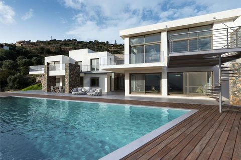 Located in Agios Nikolaos. Set on a hill side on the outskirts of Agios Nikolaos on the way to Elounda this is a unique property which enjoys the most breath- taking views from every room. The large villa (765m2) stands on three levels on a private g...