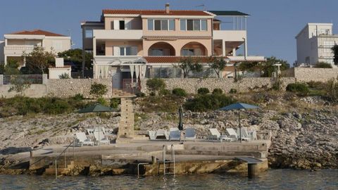 Waterfront boutique hotel of 6 apartments on the FIRST LINE of the sea in the romantic place Razanj between Trogir and Rogoznica! The building is located right on the beach! Building area - 570 m2. The building offers two studio apartments, a one-bed...