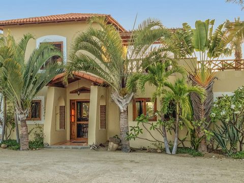 Nestled within the serene landscape of Las Tunas Todos Santos stands a charming Spanish Colonial style home beckoning those in search of tranquility and coastal charm. With its picturesque setting this three bedroom retreat offers an oasis of relaxat...