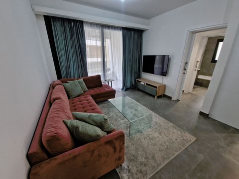 Located in Limassol. Explore modern comfort in this 1-bedroom apartment on the first floor of a newly constructed building. Fully furnished with quality furniture, featuring an open-plan living, a bathroom, two balconies, covered parking, and a stora...