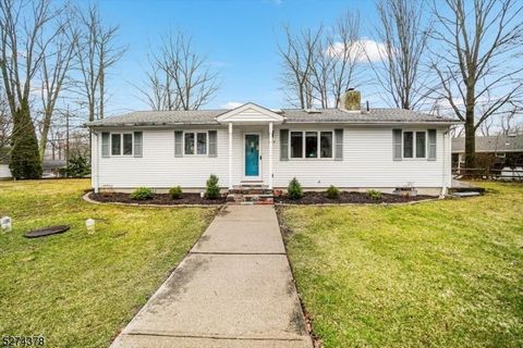 Home Sweet Home - What a Charmer! EASY ONE FLOOR LIVING! LARGE CORNER PROPERTY 2 bedroom 1 bath home with a spacious detached TWO CAR GARAGE in a lovely neighborhood. This neat and cozy RANCH with hardwood flooring in the open living/dining room show...