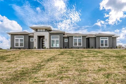 Welcome to your new home!! This brand-new, stunning, CUSTOM home built by JHI Homes, is nestled on a 2 acre tract with a front porch view of the neighborhood lake and Texas sunsets. No MUD tax in this neighborhood. 3910 Tankersley boasts a split floo...