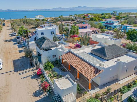 Discover the charm of Casa Serendipity in the quiet seaside community of El Comitan. Just steps from the beach this exceptional home offers a superb floor plan with 2 spacious bedrooms and 2 full bathrooms a separate casita with a full kitchen and ba...