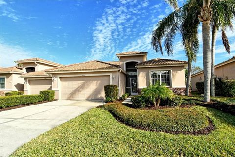 Welcome to Heritage Oaks Golf & Country Club - Sarasota's Premiere Gated, Golfing Neighborhood! This outstanding 