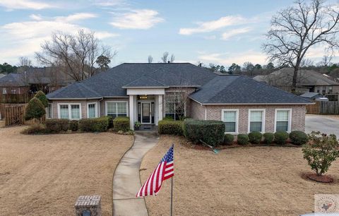 This home commands attention with its striking architectural details—truly a standout property that breaks away from the cookie-cutter mold. Step into the impressive vaulted foyer and prepare to be captivated. The versatile layout offers flexibility,...