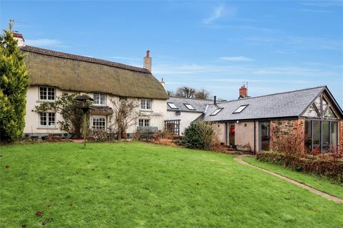 Lane End Cottage is a beautifully presented Grade II listed property, situated on the edge of the sought-after village of North Molton. Believed to date back to the 16th century, this charming home seamlessly blends period features with modern enhanc...