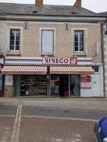 Maison avec Terrain constructible et commerce