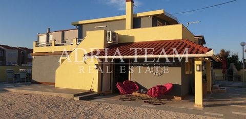 We offer for sale a beautiful apartment house in a great location in the 1st row to the sea. The house consists of two floors. On the ground floor there are two apartments: a two-bedroom apartment with a net usable area of 55 m2 with a terrace of 16 ...