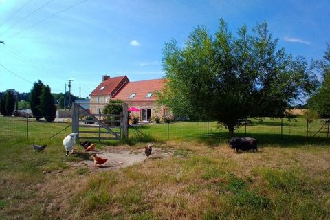 Lovingly renovated country house with private terrace. The picturesque property with a total of three residential units is located on a large shared garden plot in the hinterland of the bay of the famous Mont St. Michel. The property, which dates bac...