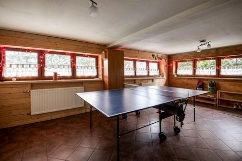 Fantastic holiday home with a fireplace and a wonderful panoramic view of the valley - ideal for an unforgettable holiday with the whole family. The house is idyllically situated on a large garden plot, on the edge of the forest, at the foot of the C...