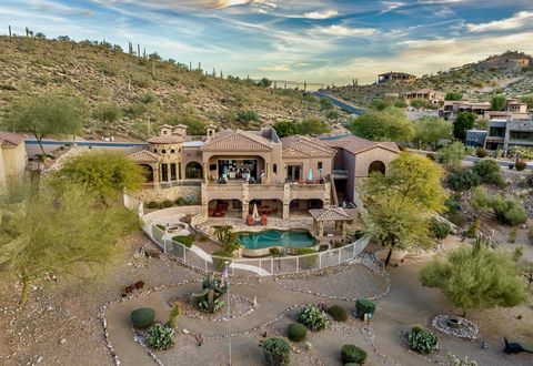Amazing custom home w/every conceivable upgrade. OFFERED TURNKEY FURNISHED MINUS PERSONAL ITEMS, PIANO and ART WORK. Adjacent lot included making this 1.3 acres of Heaven on the 12th fairway. Gold Canyon, Arizonas best kept secret--only 1 traffic lig...