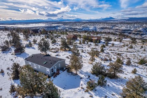 Ask about Oregon Bond Residential Loan Program, offering 5.75% rates or closing cost help! Welcome to your idyllic retreat in Crooked River Ranch. Sitting on the top of a hill, this 3.62 acre property features panoramic views of the Cascade Mountains...