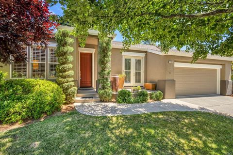 Tucked on a quiet tree-lined street you will find this beautiful home in the heart of the Napa Valley. Pristine and move-in ready with glowing wood floors, newer carpet, and plantation shutters throughout. The large open living room with fireplace, o...