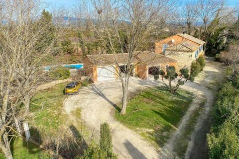 RIANI IMMOBILIER offers you for sale in the countryside of Robion, Mas, former Magnanerie from the 19th century, renovated in 1990, offering 170 m² of living space, garages, swimming pool, ornamental pond, summer kitchen, very beautiful garden with t...