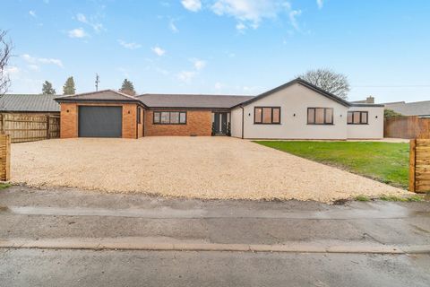 Located in highly sought after Nether Heyford this detached bungalow has been skilfully extended and fully renovated by the current owners to exacting and luxurious standards. The property is set back from the village road with a gravel driveway with...